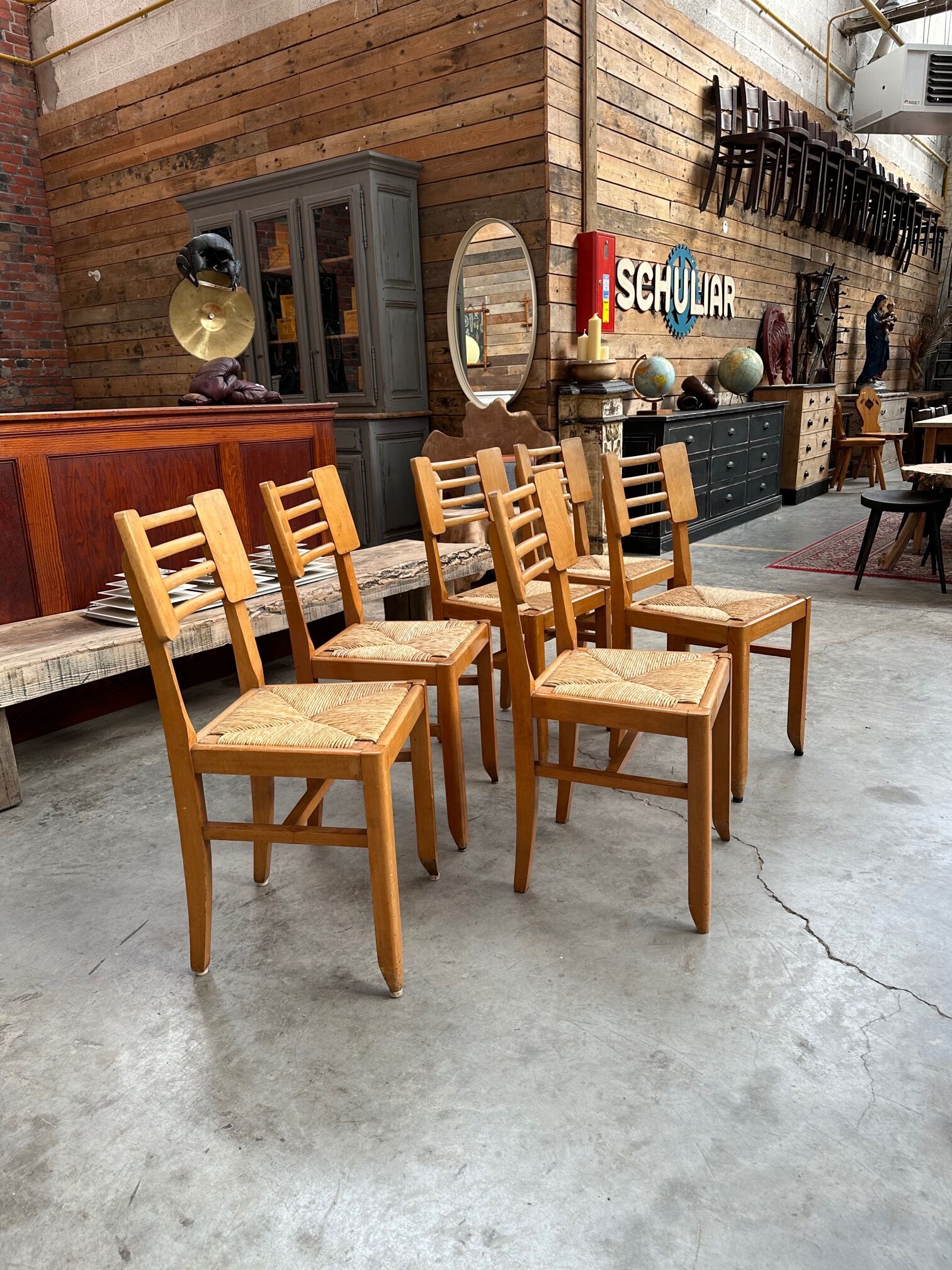 Suite of 6 Pierre Cruège chairs