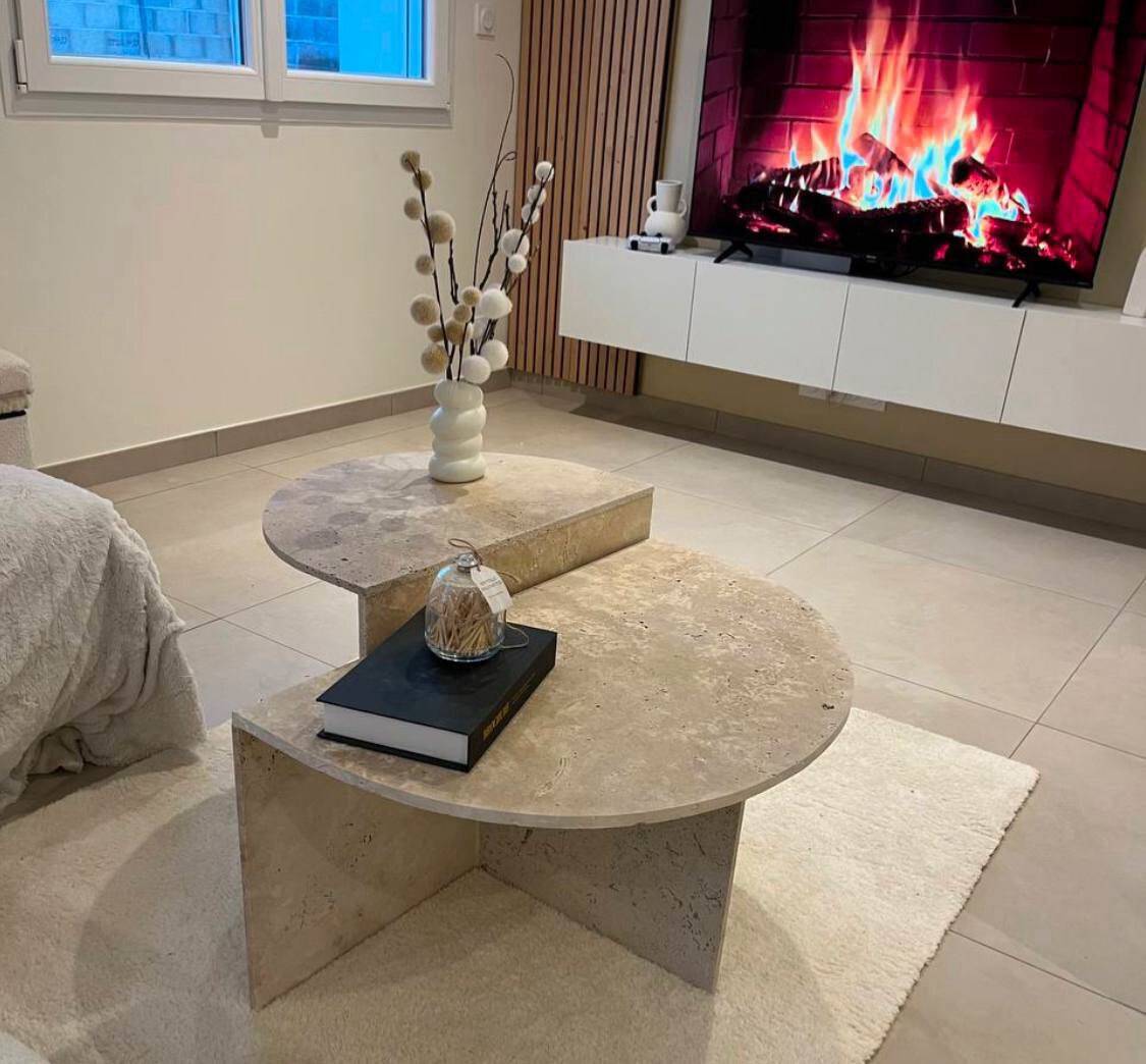 Half-moon travertine coffee table
