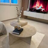 Half-moon travertine coffee table