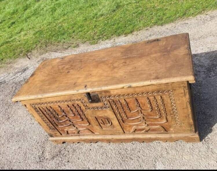 wedding chest in solid fruit wood carved with 2 Menorahs and Hebrew symbol from the 18th century or even before.