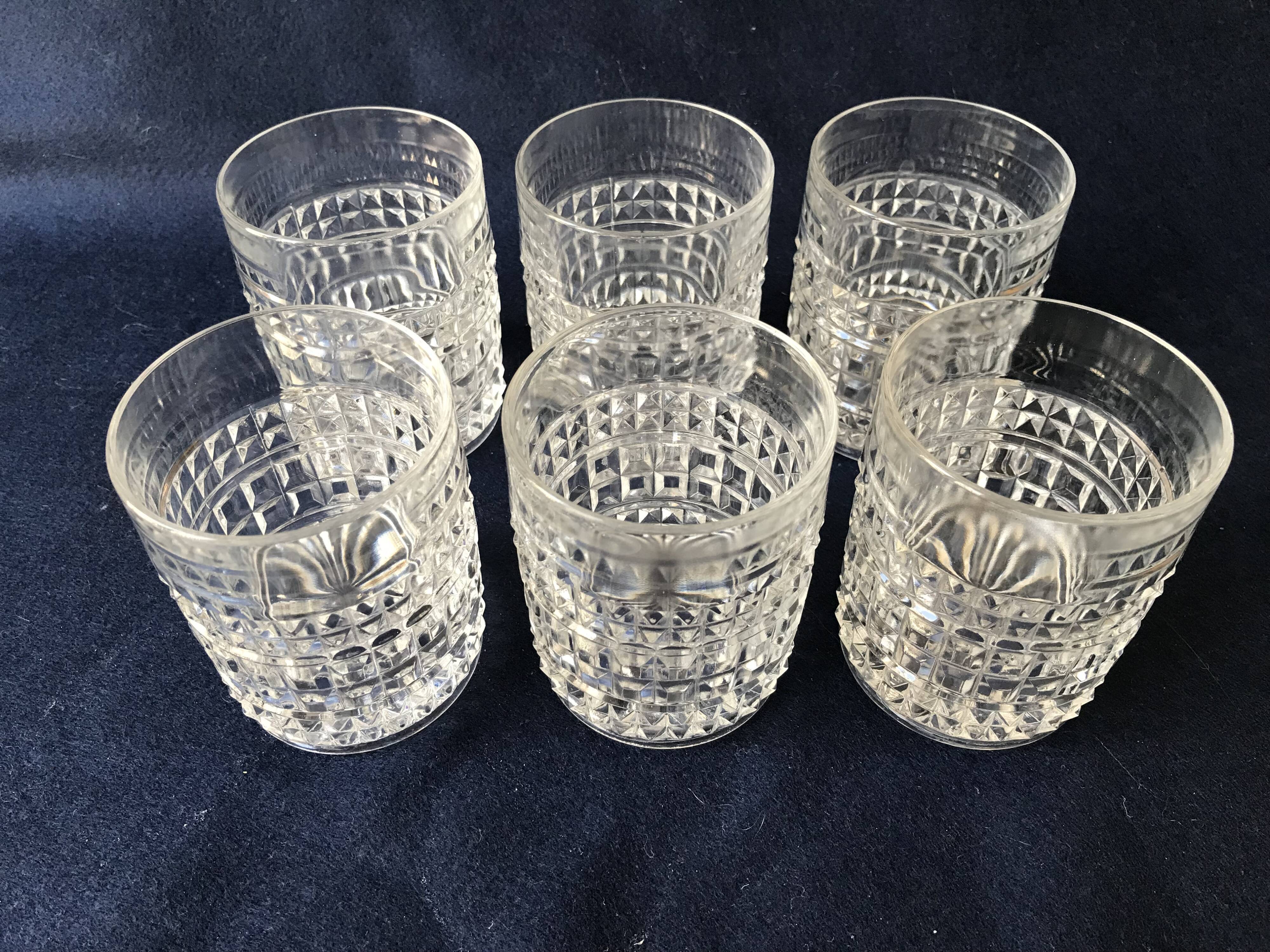 Six diamond-tipped cut glass cups
