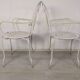 4 wrought iron garden armchairs