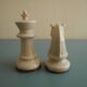 two ceramic chess pieces decorative