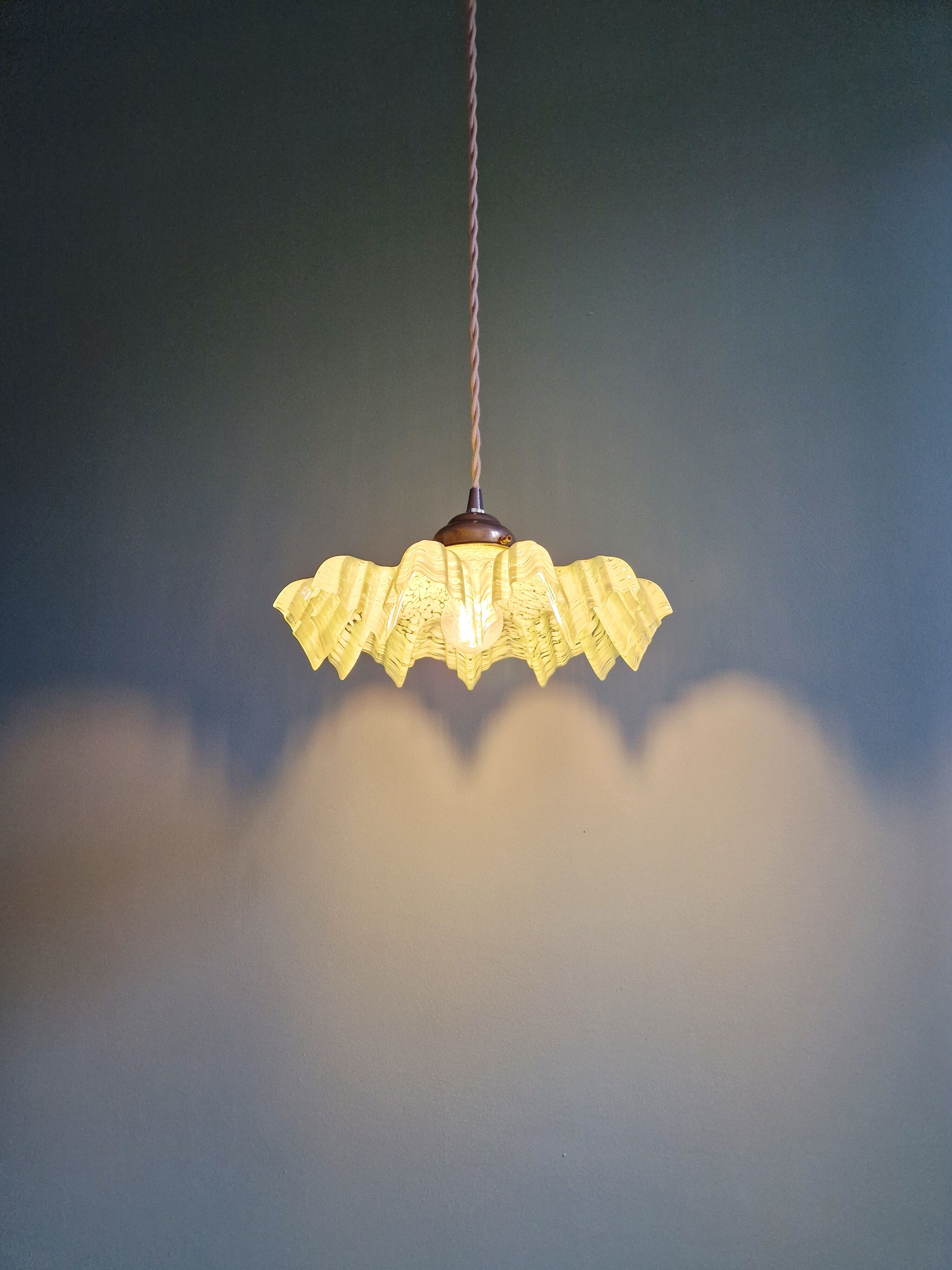 Art Deco pendant light in speckled green and white pleated glass, 1920s-30s.