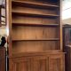 Bibus bookcase of walnut parquet with blonde patina