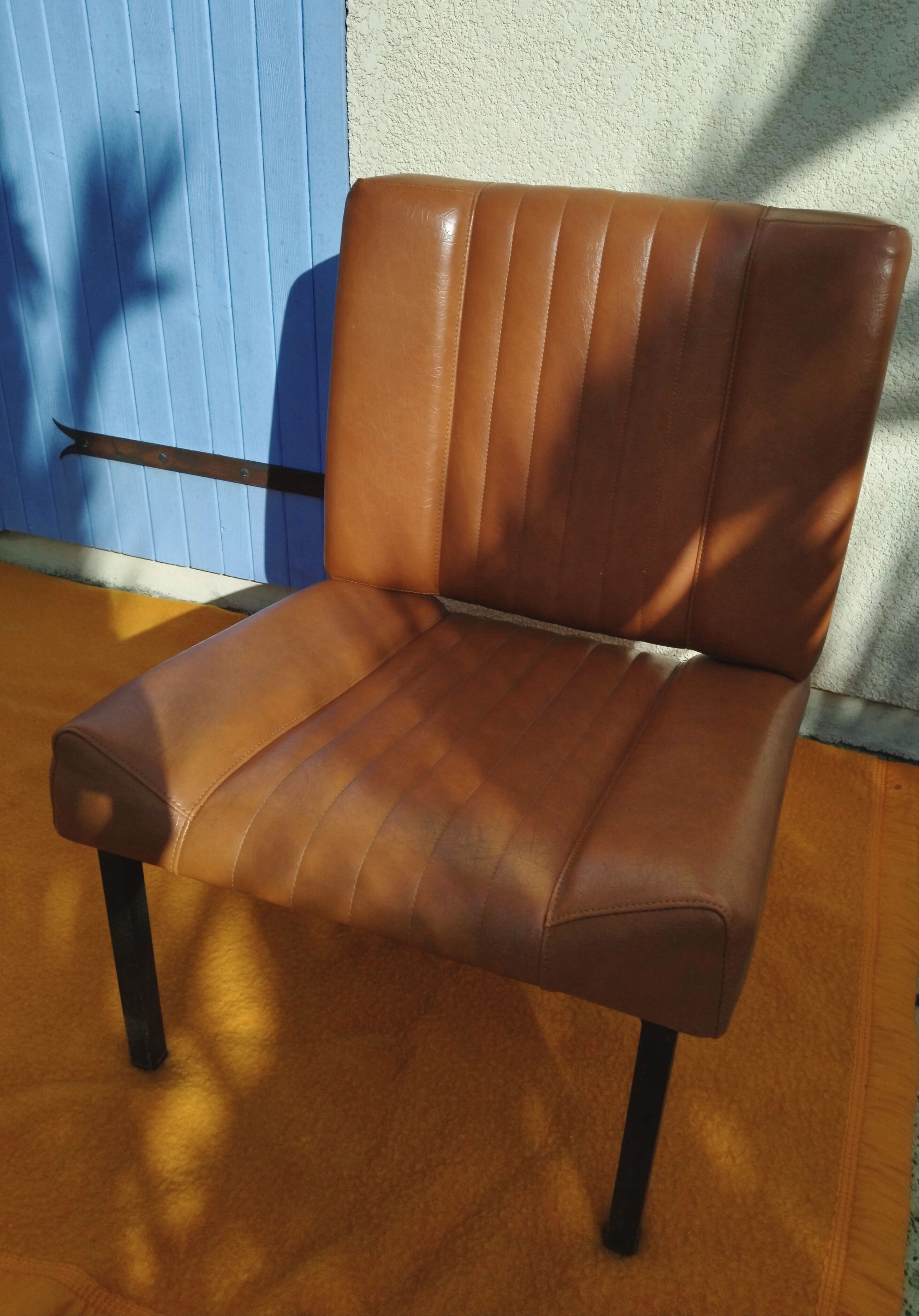 Pair of lounge armchairs, 70s leather