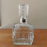 Glass carafe in the shape of a perfume bottle