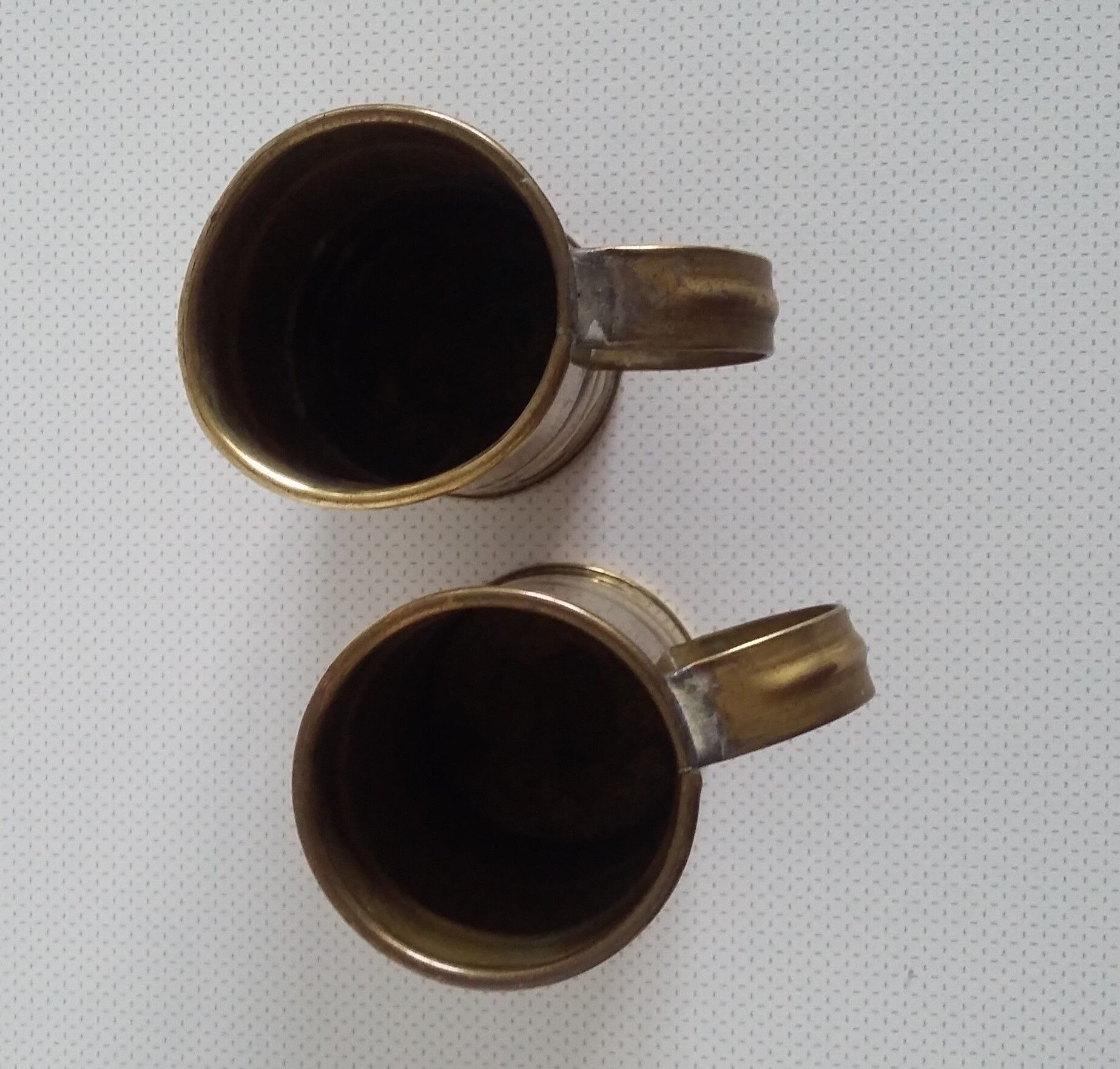 Pair of brass steins