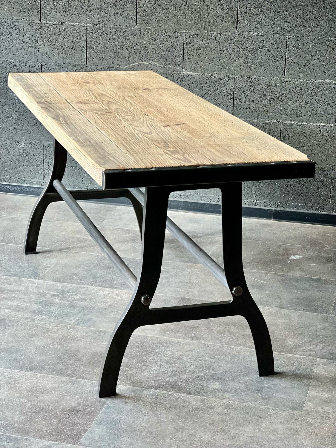 Industrial table with cast iron legs