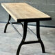 Industrial table with cast iron legs