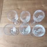 Set of 6 glasses with gold band decorations.