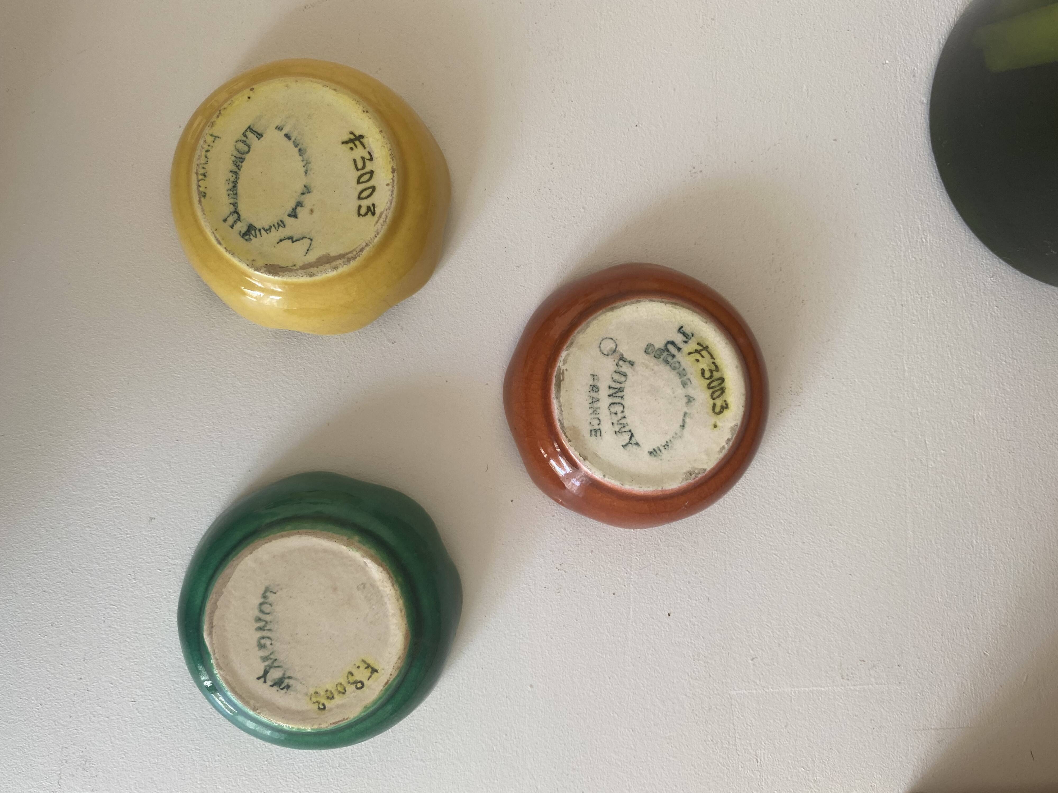 Trio of empty cups Longwy pocket