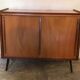 Vintage storage cabinet sliding doors feet compass