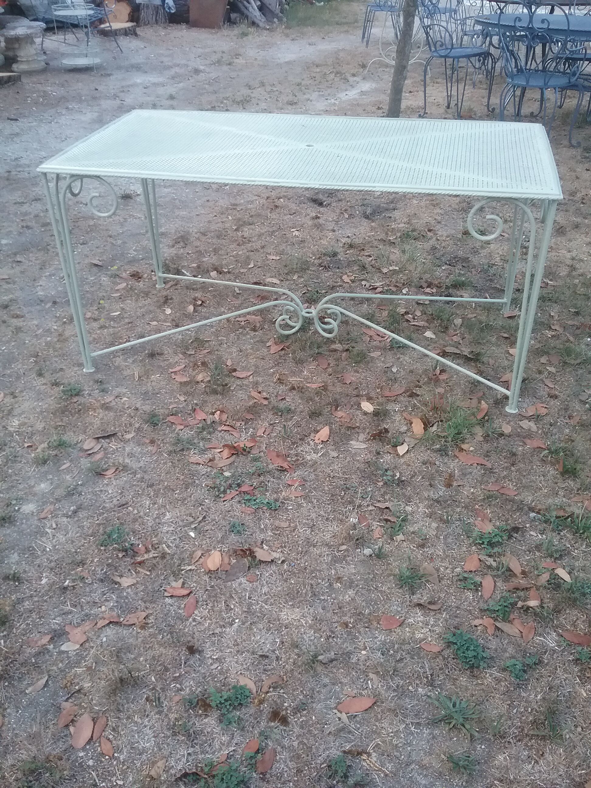 Garden furniture in green wrought iron