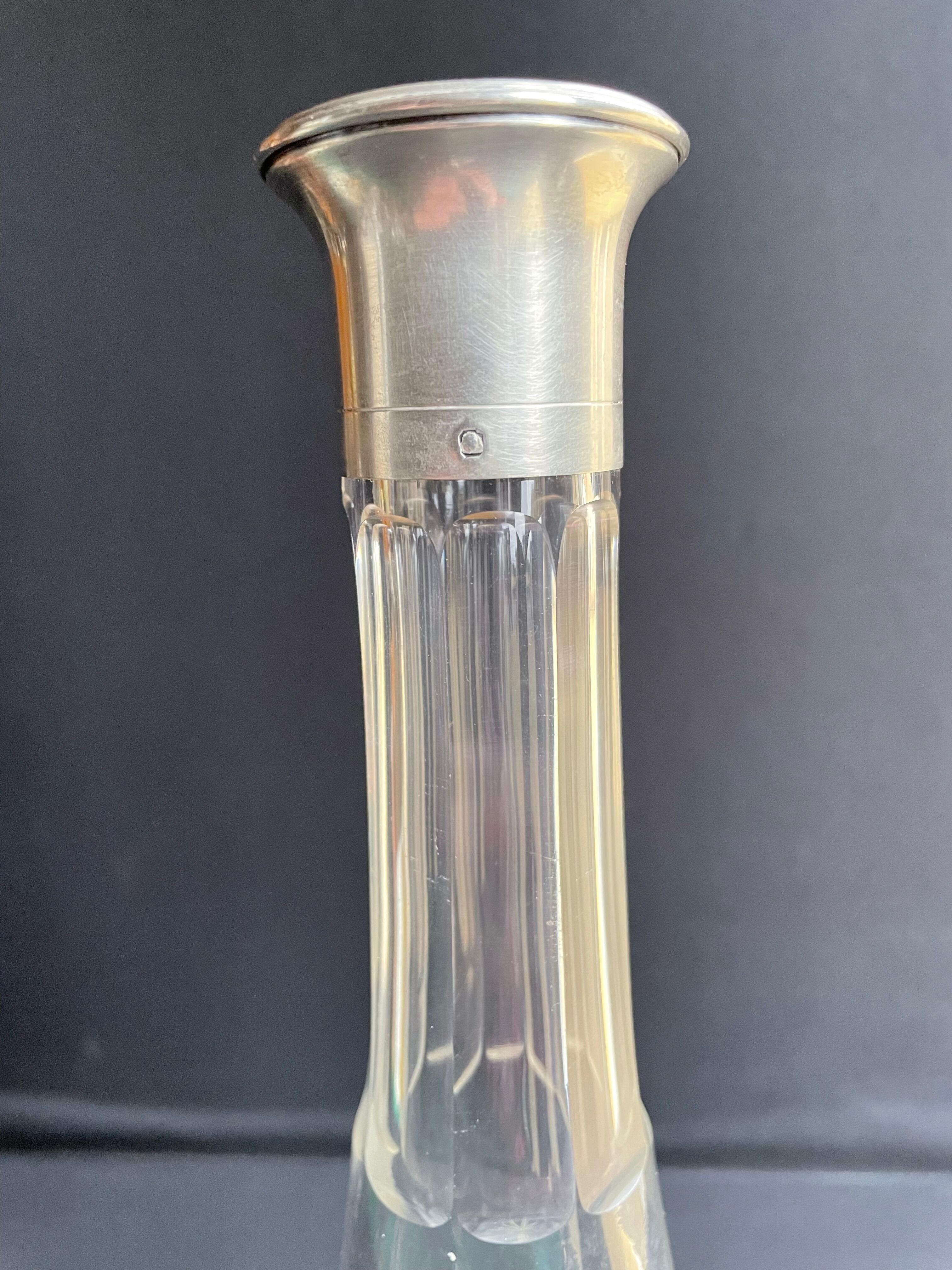 Blown crystal decanter, cut and silver collar