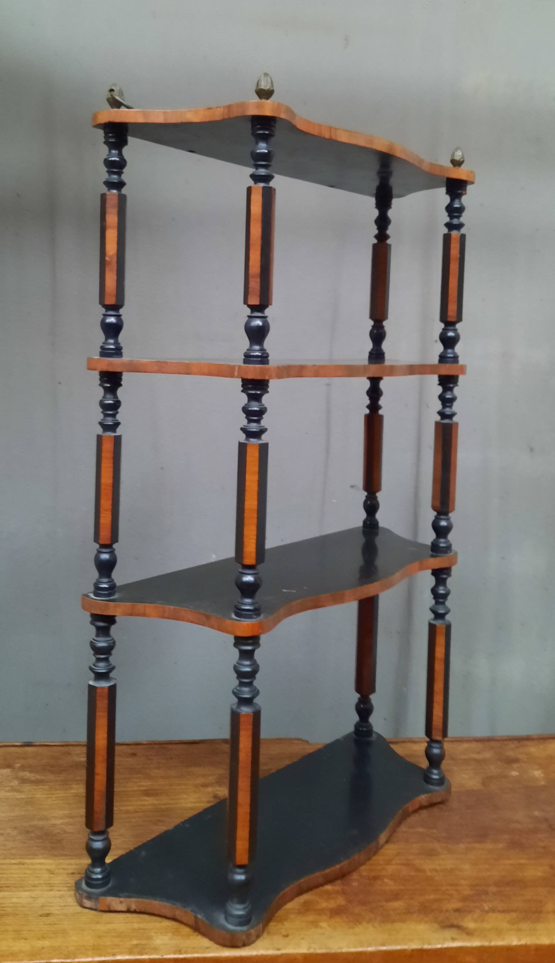 Blackened wooden wall shelf