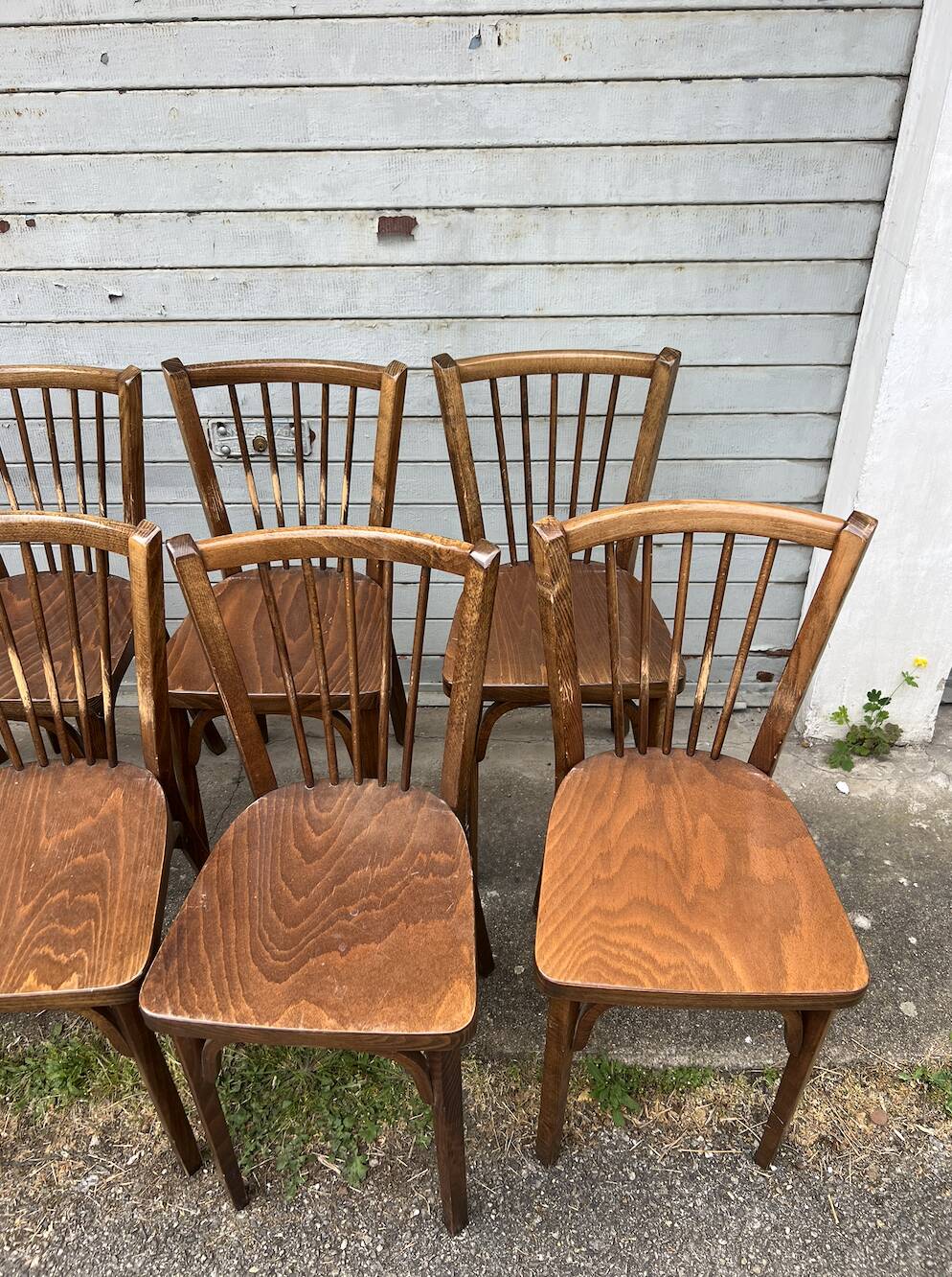 (Lot) 8 chaises bistrot estampillées Baumann