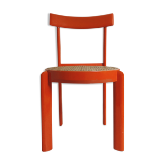 Vintage orange lace-up wooden chair and caning seat