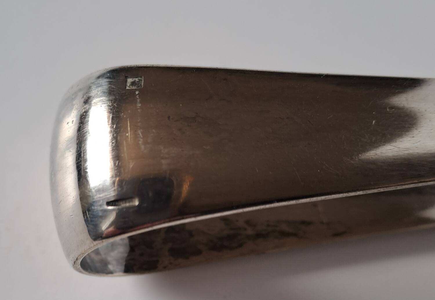 Silver-plated sugar tongs by Christofle