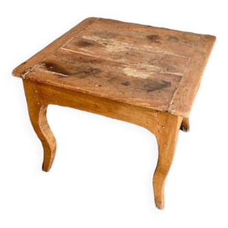 Table with curved legs