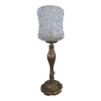 Vintage table lamp with a bronze base and moulded glass globe.