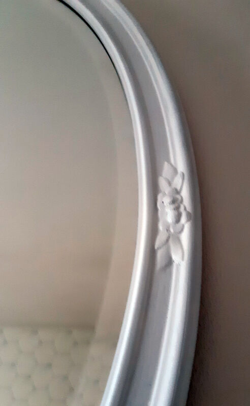 Vintage white oval mirror in resin.