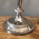 Silver metal candle holders that can be paired.