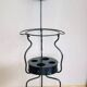 Foldable wrought iron support from the 19th century for a toilet set.