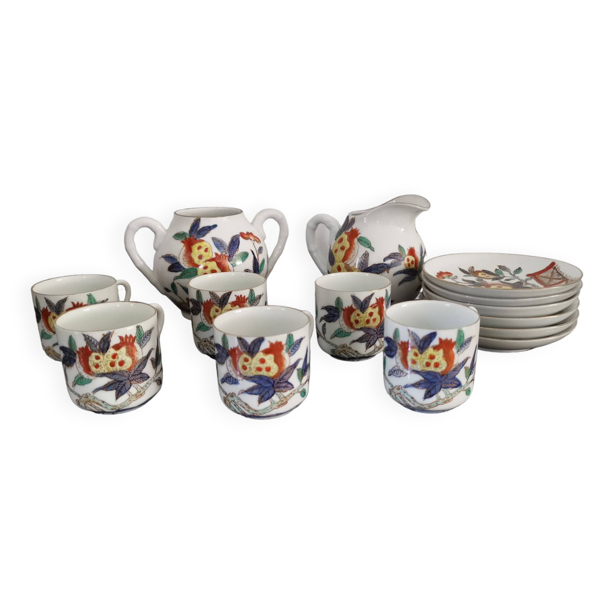 Set of 6 porcelain cups, 6 saucers, teapot and milk jug