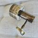 Wall light Jo Hammerborg in patinated brass, gun barrel finish, Denmark, 1970s.