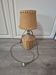 vintage table lamp dame jeanne covered in rattan wicker with a handle