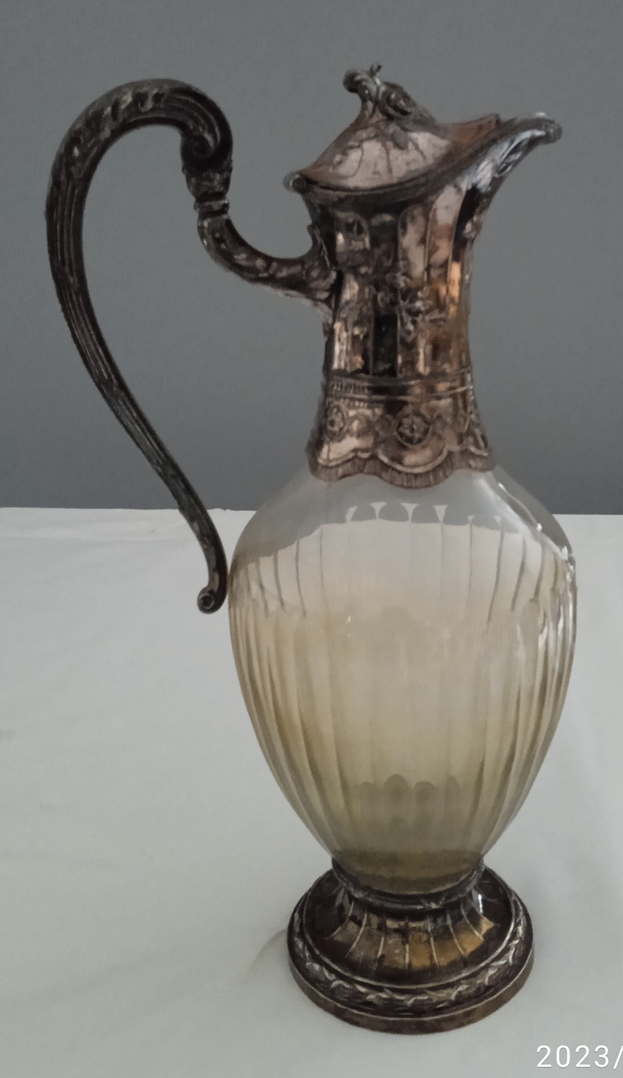 Glass and silver metal ewer