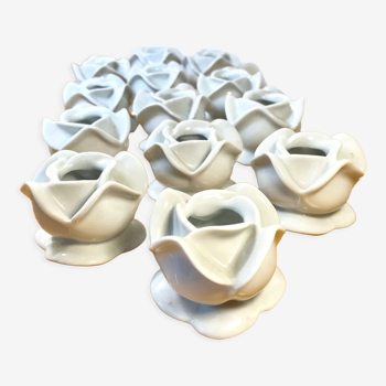 13 rose-shaped porcelain candle holders