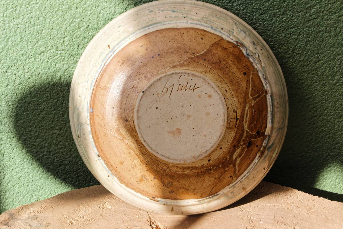 Hollow stoneware dish, signed Yves Loiselet