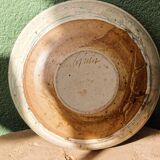 Hollow stoneware dish, signed Yves Loiselet