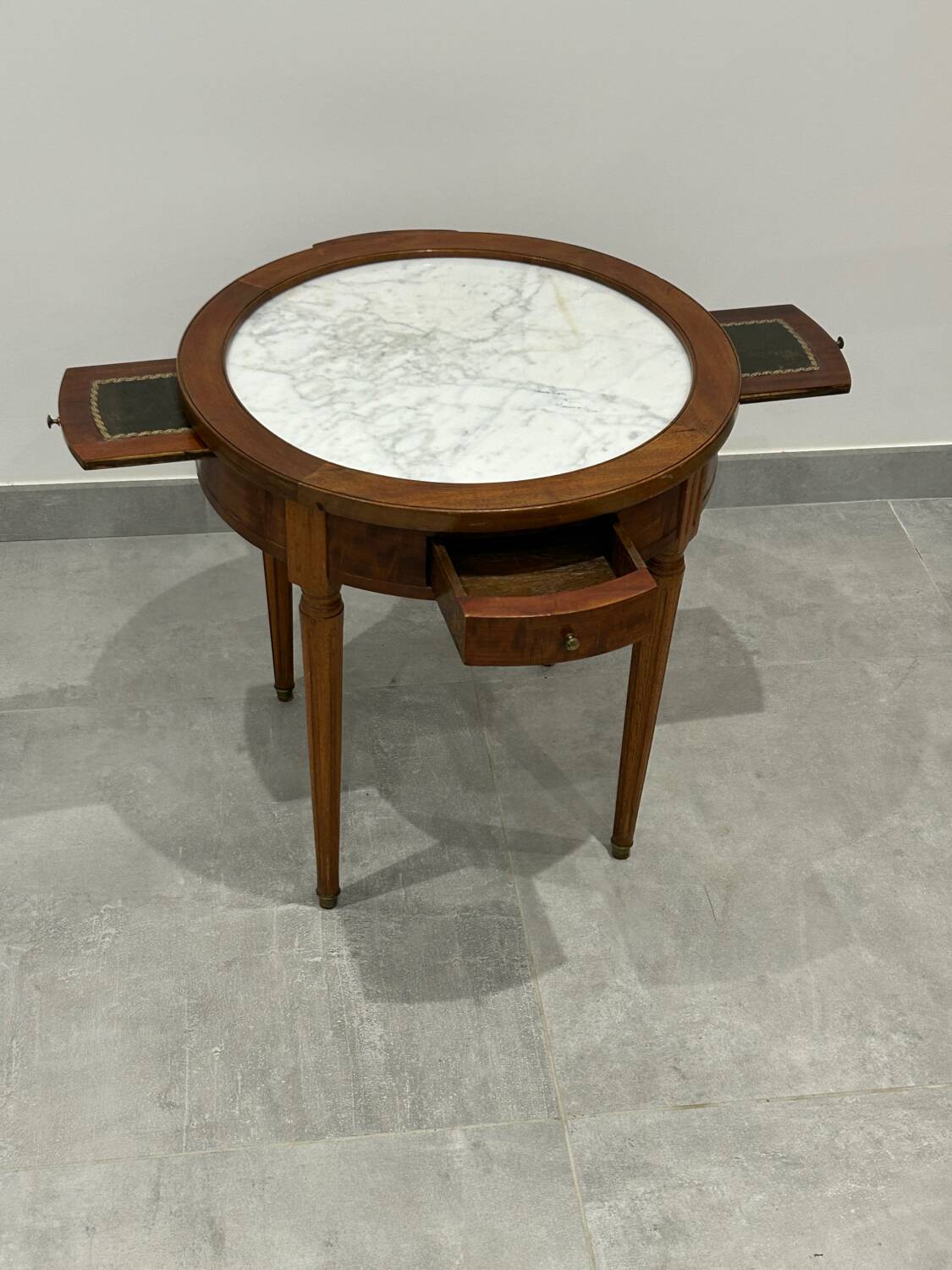Low bouillotte side table with a pull and drawers.