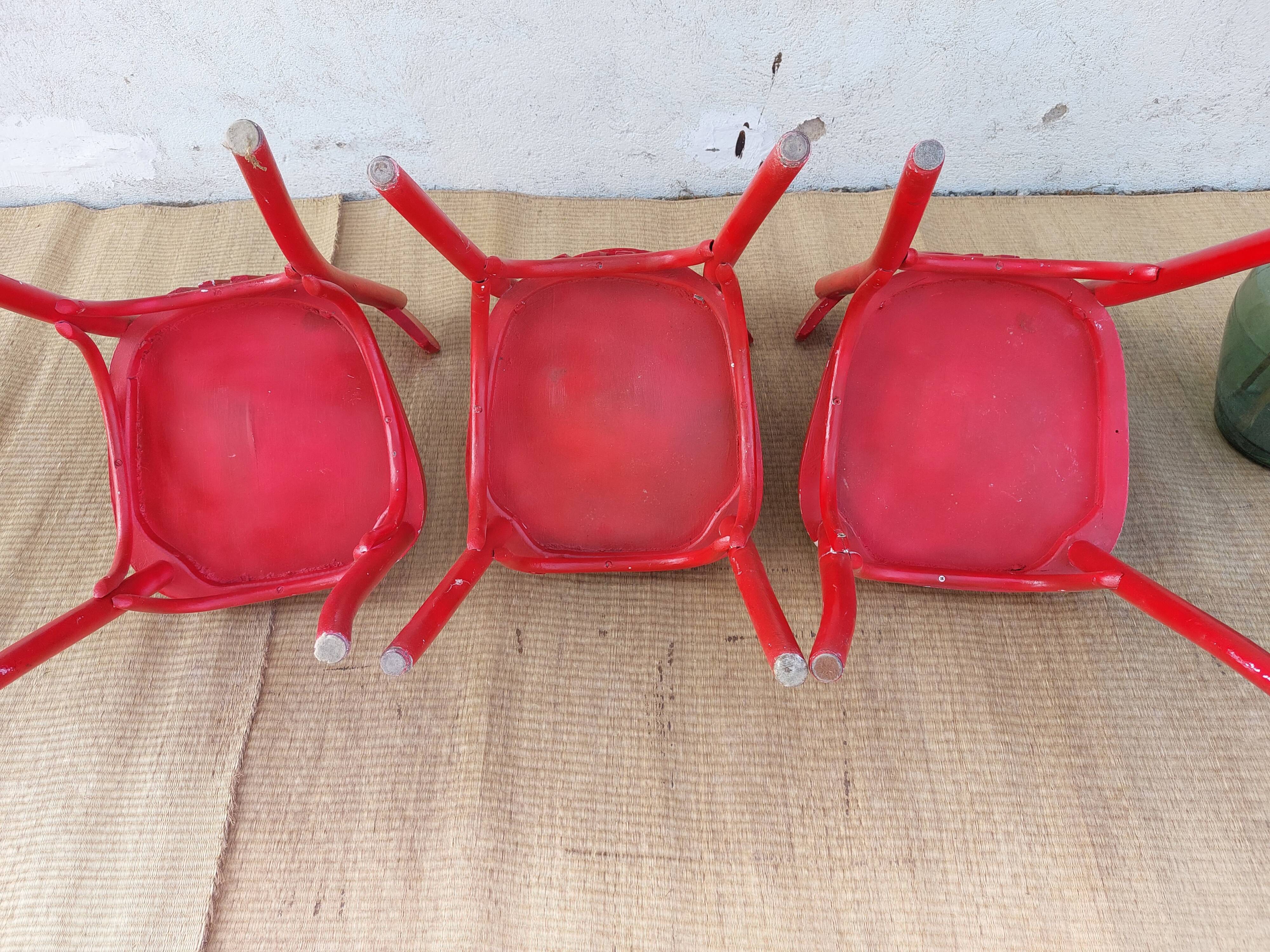 Red baumann chairs