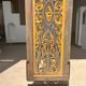 Rectangular Indonesian construction element with blue and yellow plant in carved wood