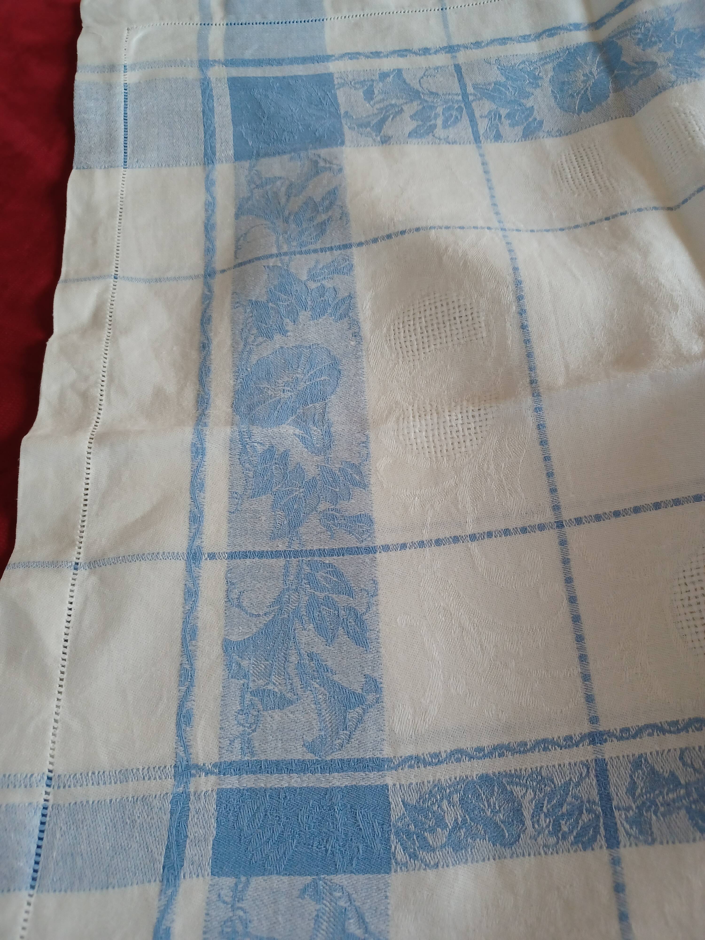 White and sky blue damask tablecloth and 10 towels