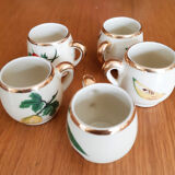 5 antique cups with liquor, porcelain fruits