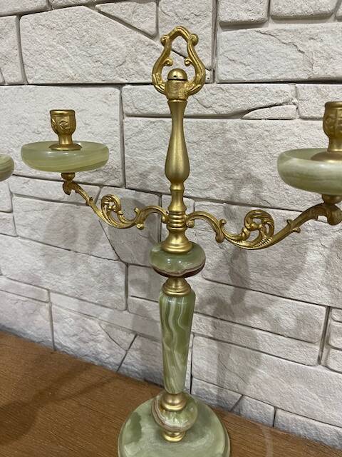 Pair of onyx and brass candlesticks