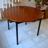 Dining table Pierre Guariche, teak and black steel from the 1960s with extension.