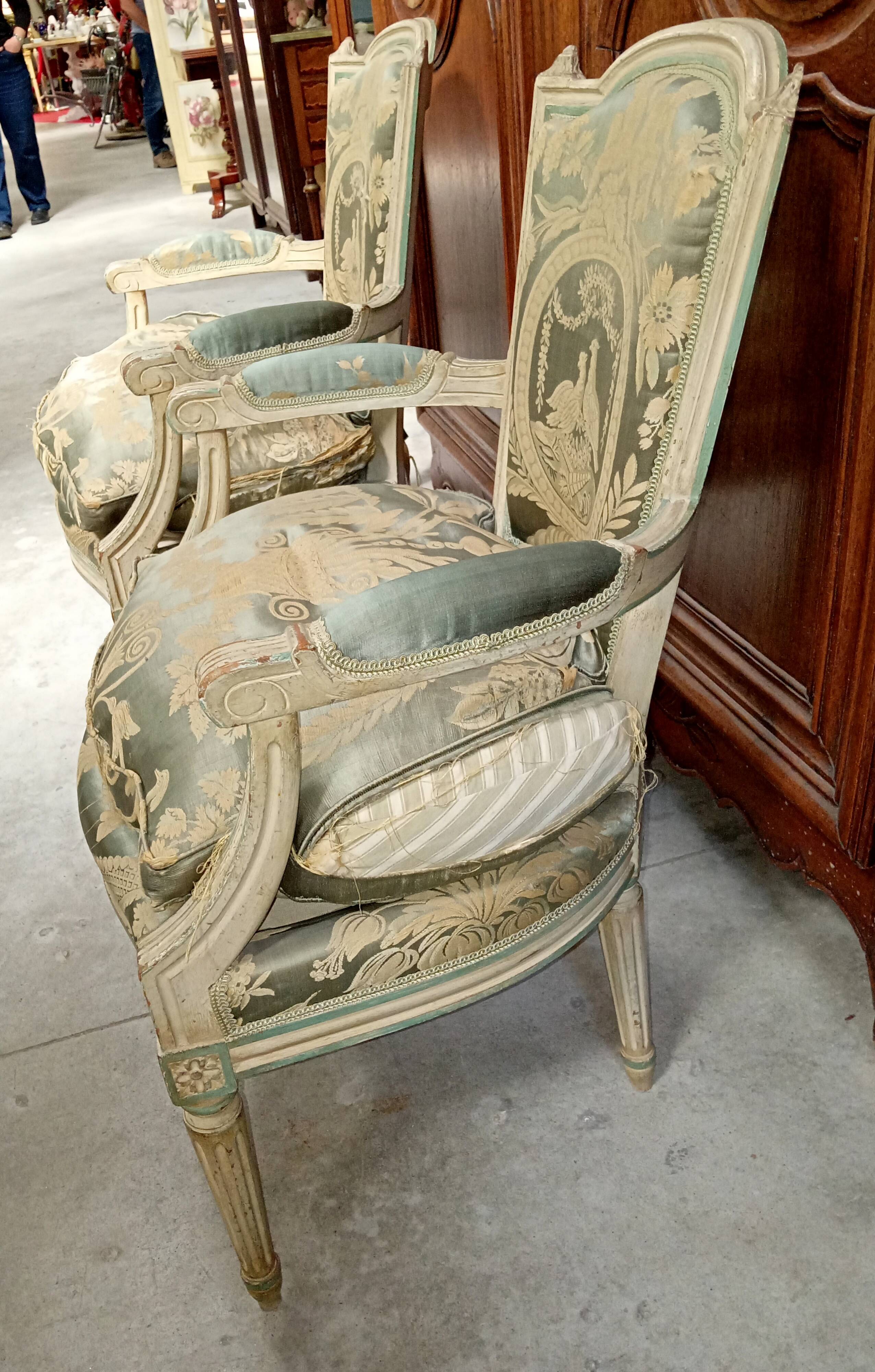Pair of large Louis XVI armchairs in water green and cream wood.