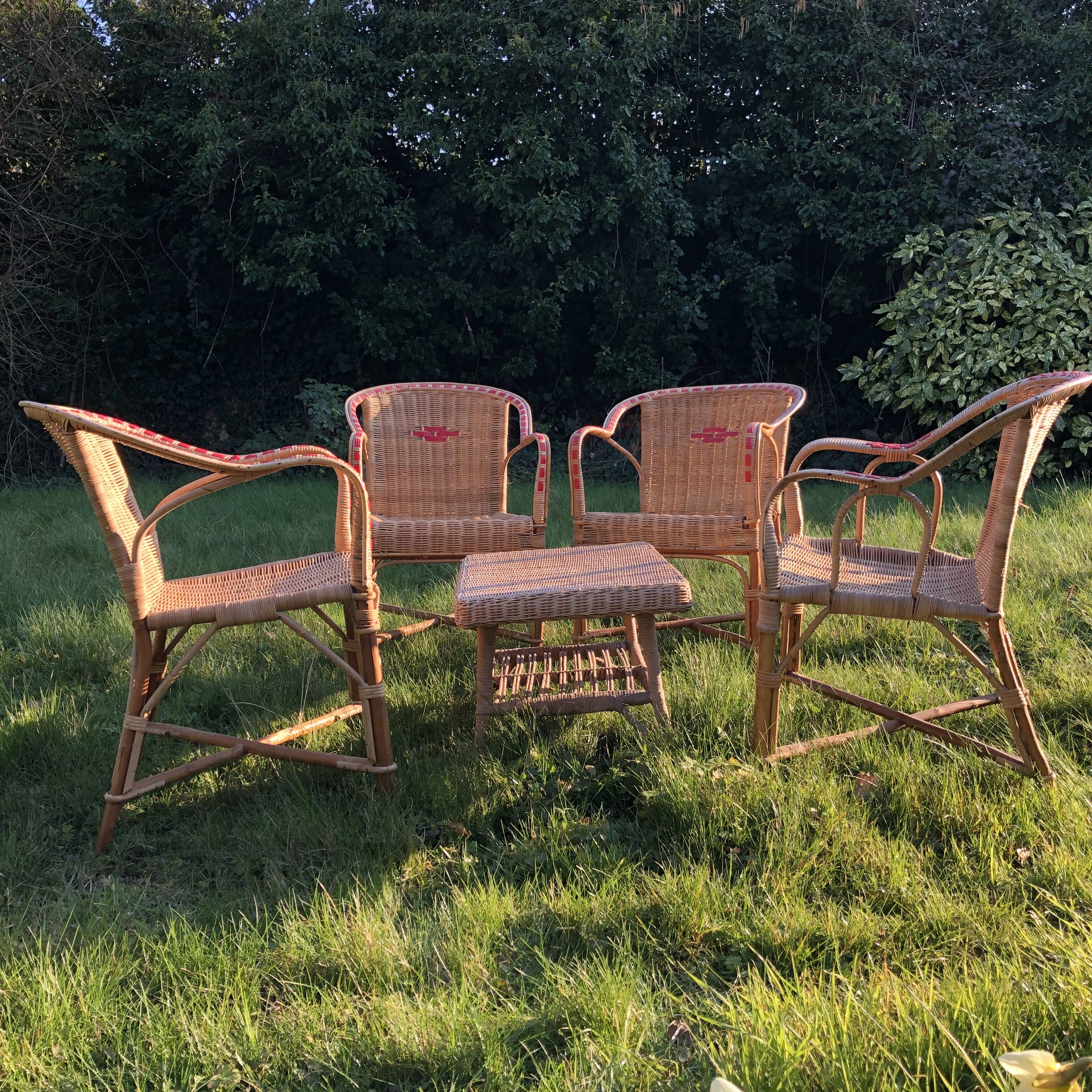 Rattan garden armchairs and coffee table