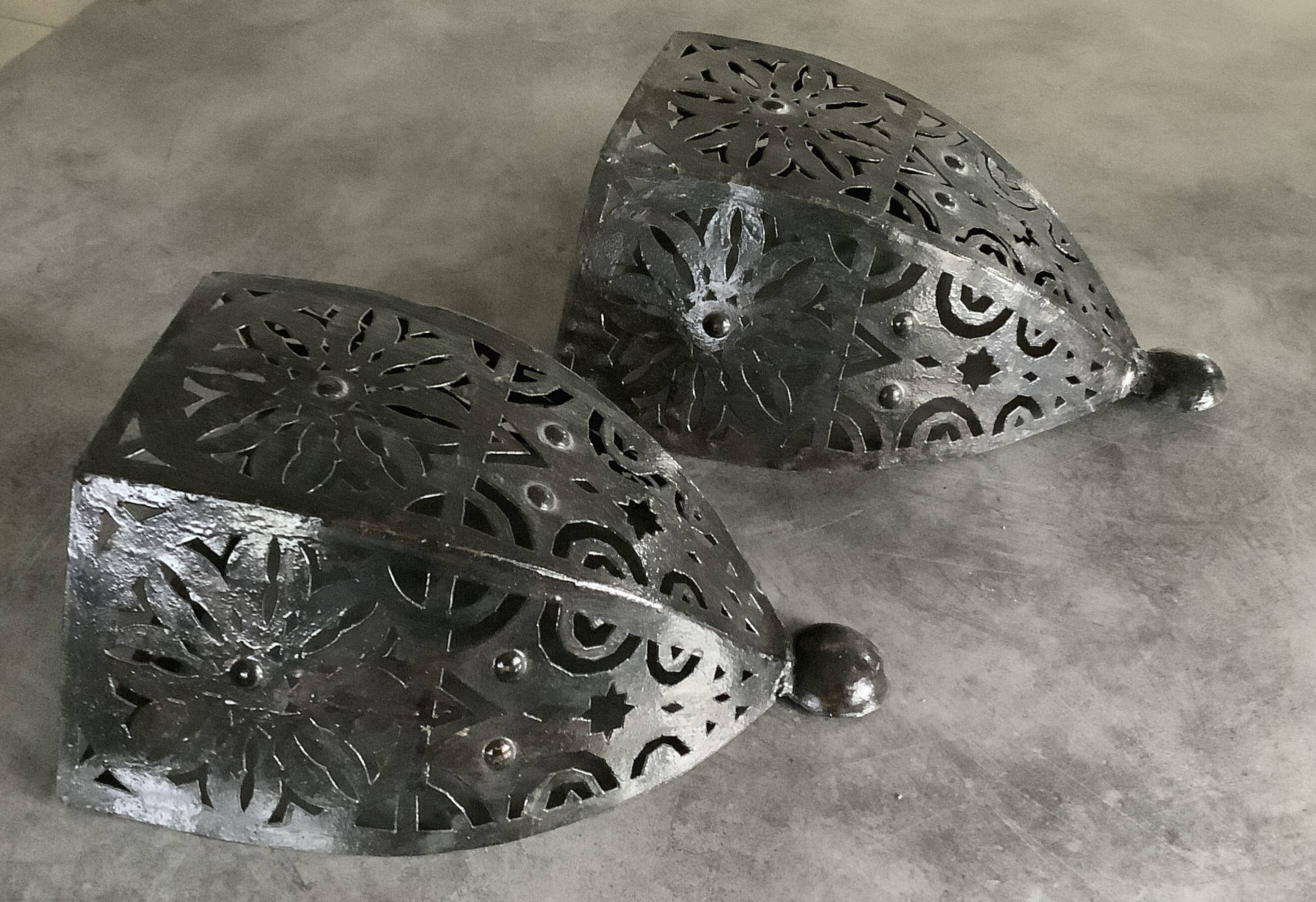 Pair of Wall Sconces in Iron with Cut-Out Patterns
