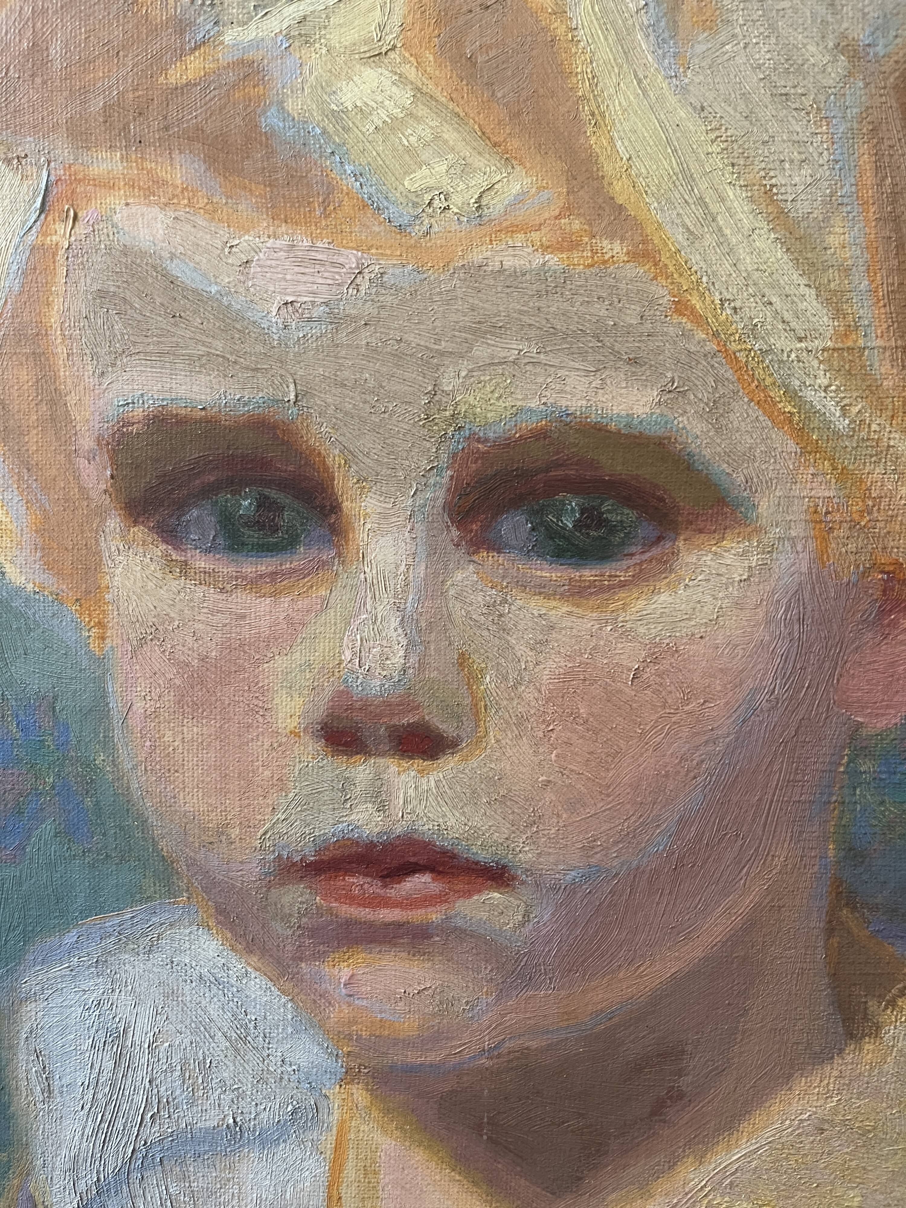 Oil on canvas, portrait of a child signed J. Bertrand, early 20th century.