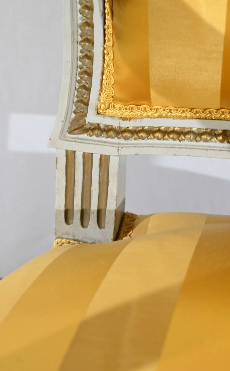 Pair of Cabriolet Armchairs, in rechampi wood, Louis XVI style – Late 19th century