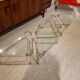 Coffee table and its 4 associated nesting tables in plexiglass and gold metal