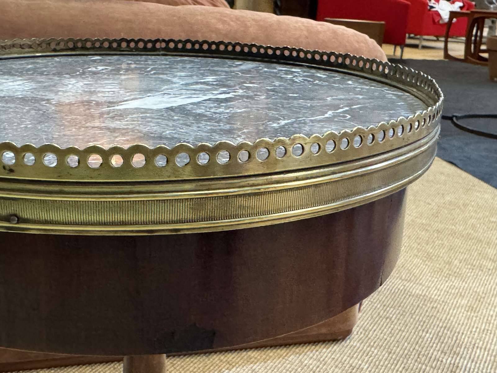 Mahogany gueridon with marble top from the 1950s.