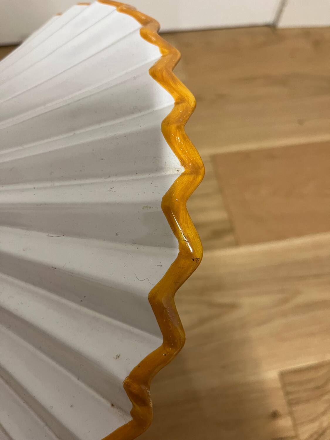 Pleated ceramic suspension